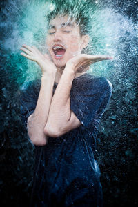 Portrait of a young man in swimming pool
