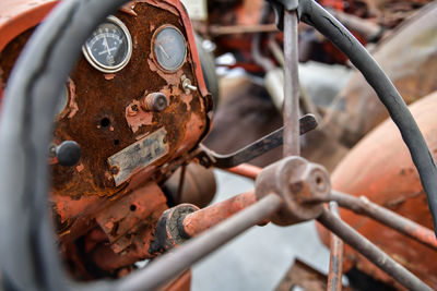 Vintage farm tractor steering wheel and gauges