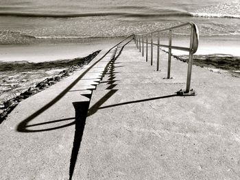 Steps at beach during sunny day