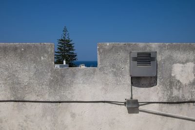 Low angle view of built structure against blue sky