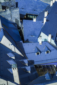 High angle view of house rooftops in town