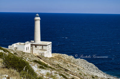 Scenic view of sea against blue sky