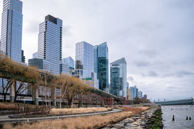 Buildings in city against sky