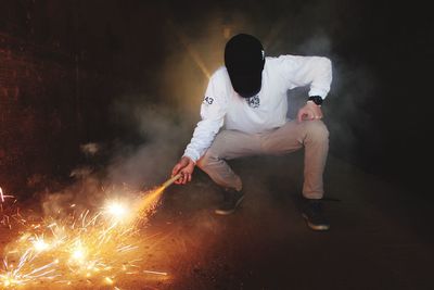 Man holding firecracker