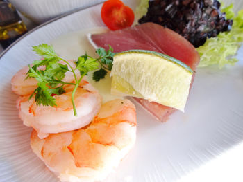 Close-up of fish served in plate on table