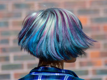 Rear view of young woman with dyed hair