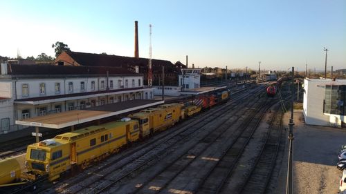 High angle view of train in city against clear sky