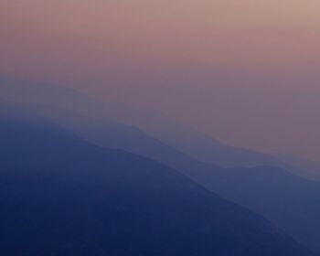 Scenic view of mountains against sky during sunset