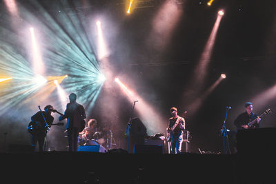 People enjoying music concert