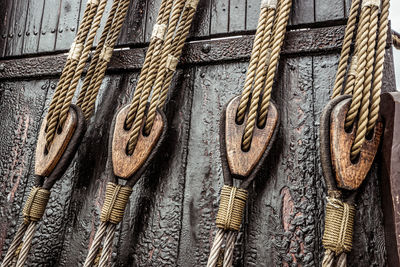 Low angle view of ropes hanging on boat