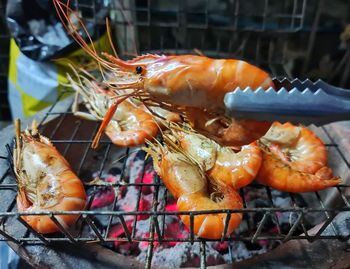 Close-up of meat on barbecue grill