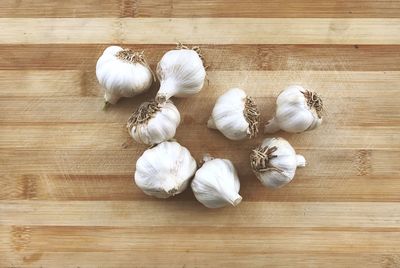 High angle view of white garlic on table