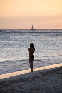 Scenic view of sea at sunset