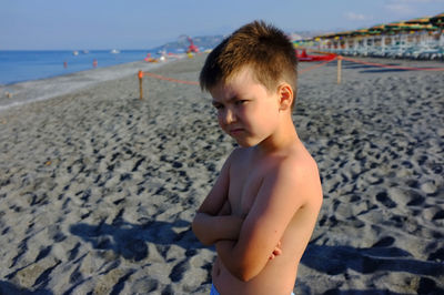 Boy looking at beach