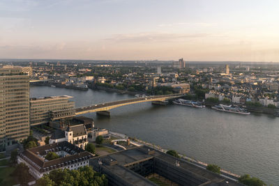 High angle view of river amidst buildings in city