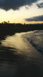 View of river against cloudy sky