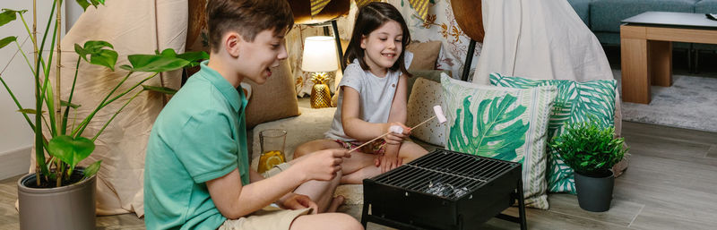 Kids doing barbecue at home