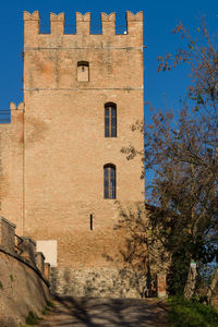 Low angle view of historic building against sky