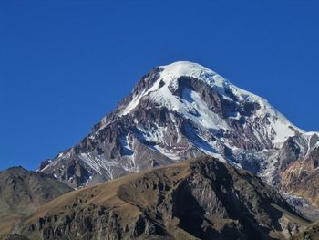 Scenic view of snowcapped mountain- mkinvartsveri.