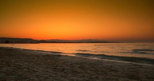 Scenic view of sea at sunset