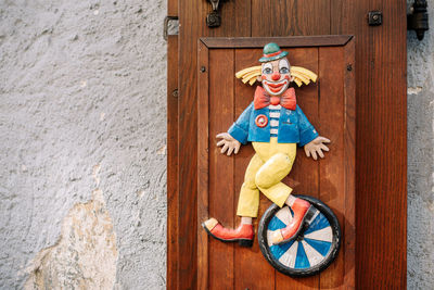 View of stuffed toy against wall