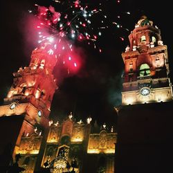 Low angle view of illuminated temple