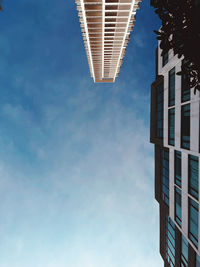 Low angle view of skyscraper against sky