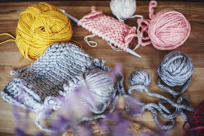 High angle view of wools on wooden table