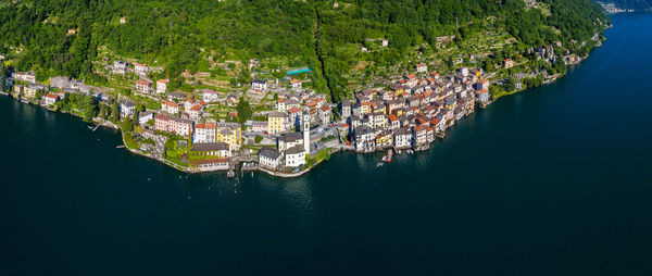 High angle view of townscape by sea