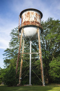 Low angle view of water tower against sky