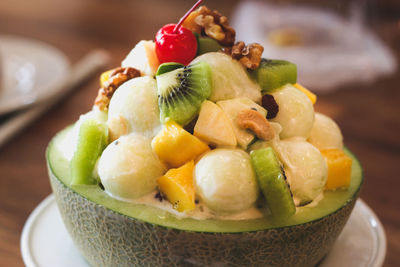 Close-up of fruits in bowl on table