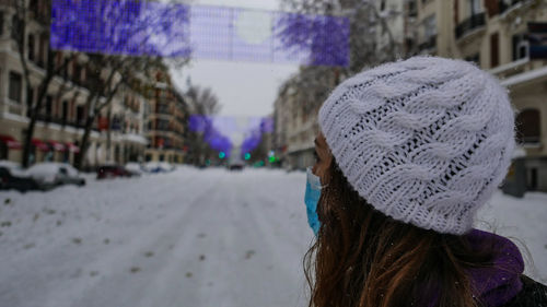 Rear view of woman in hat