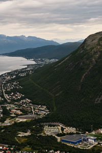 High angle view of buildings and mountains against sky