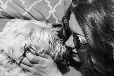 Woman in sunglasses with dog