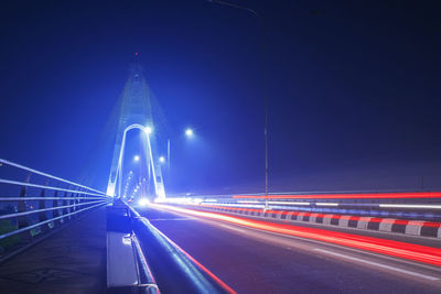 Light trails on road at night