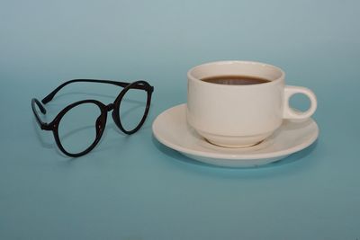 Close-up of coffee cup on table