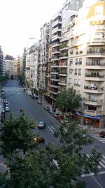 High angle view of street amidst buildings in city