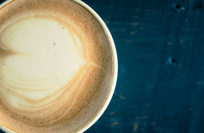 High angle view of coffee cup on table