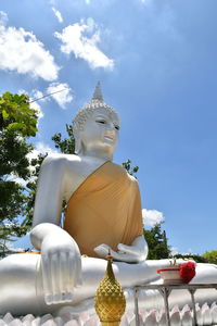 Low angle view of statue against sky