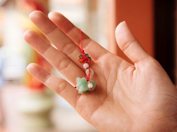 Close-up of woman holding hands