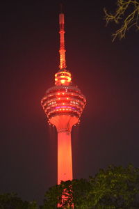 Low angle view of illuminated building at night