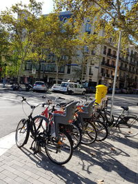 Bicycles parked on street in city