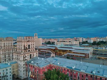 High angle view of buildings in city against sky