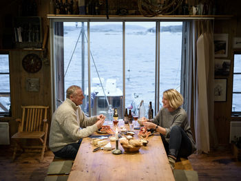 Mature couple having meal