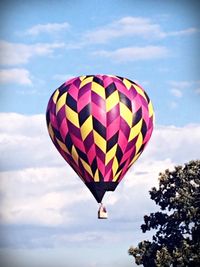 Hot air balloon flying against sky