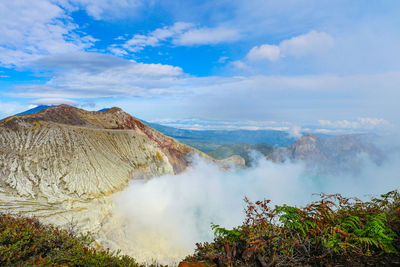 Panoramic view of volcanic landscape against sky