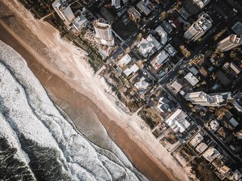 Aerial view of sea and cityscape