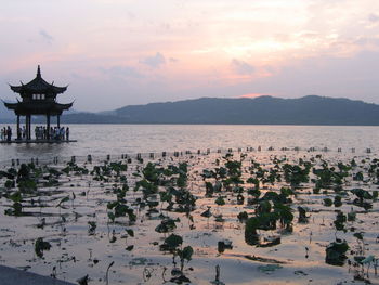 Scenic view of sea against sky during sunset