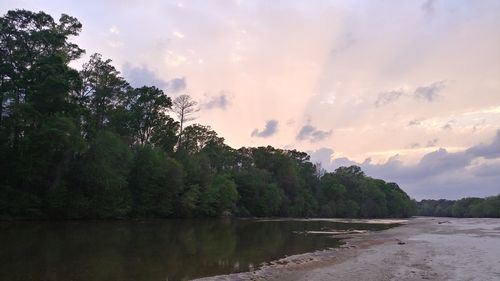 Scenic view of lake against sky during sunset