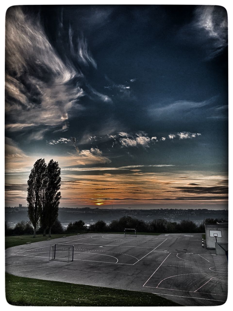 VIEW OF FIELD AGAINST CLOUDY SKY